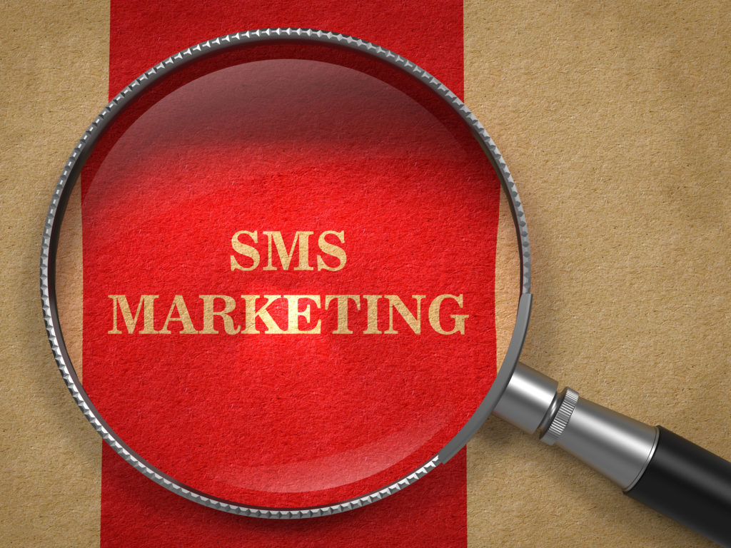 SMS Marketing through Magnifying Glass.